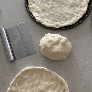 sourdough pizza dough cooks best when you don't use a rolling pin