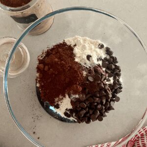 Mixing chocolate sourdough discard bread.