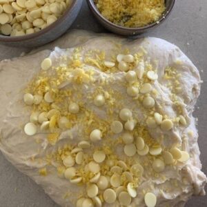 stretching and folding lemon and white chocolate sourdough.