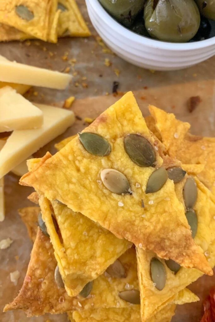 Pumpkin Sourdough Crackers topped with pumpkin seeds is one of the best sourdough cracker recipes.