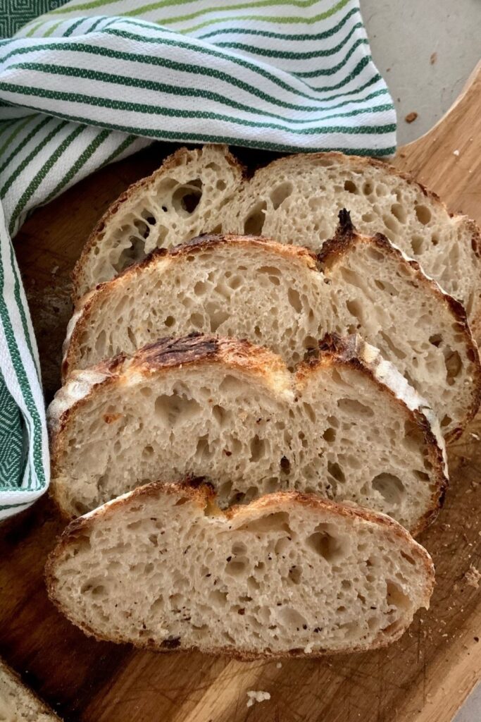 Neat, even slices of plain sourdough bread.