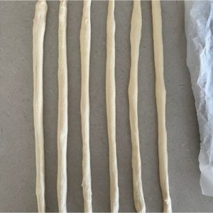Pretzel dough rolled into 45cm long strips