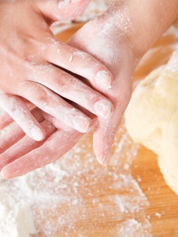 Dry hands from mixing bread dough and sourdough