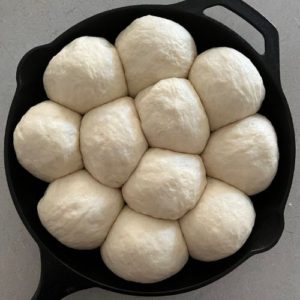 Allow the discard rolls to get super puffy before you bake them.
