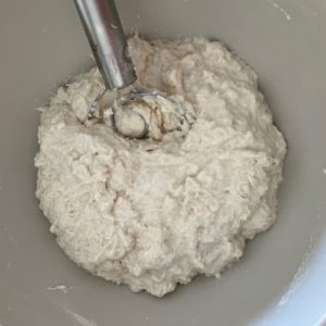 Wet dough that has been mixed with a Danish Dough Whisk.