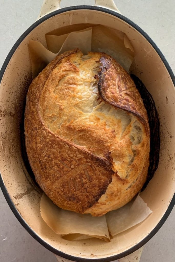 Sourdough bread scored with an "S" score pattern