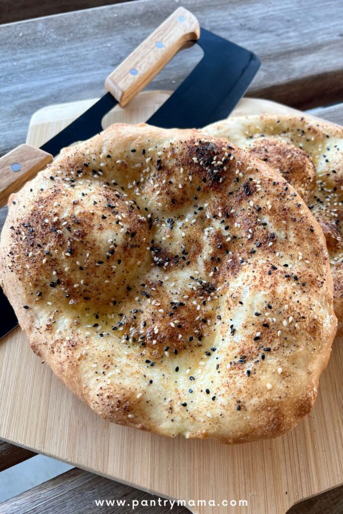 Seasoned flat bread made from pizza dough