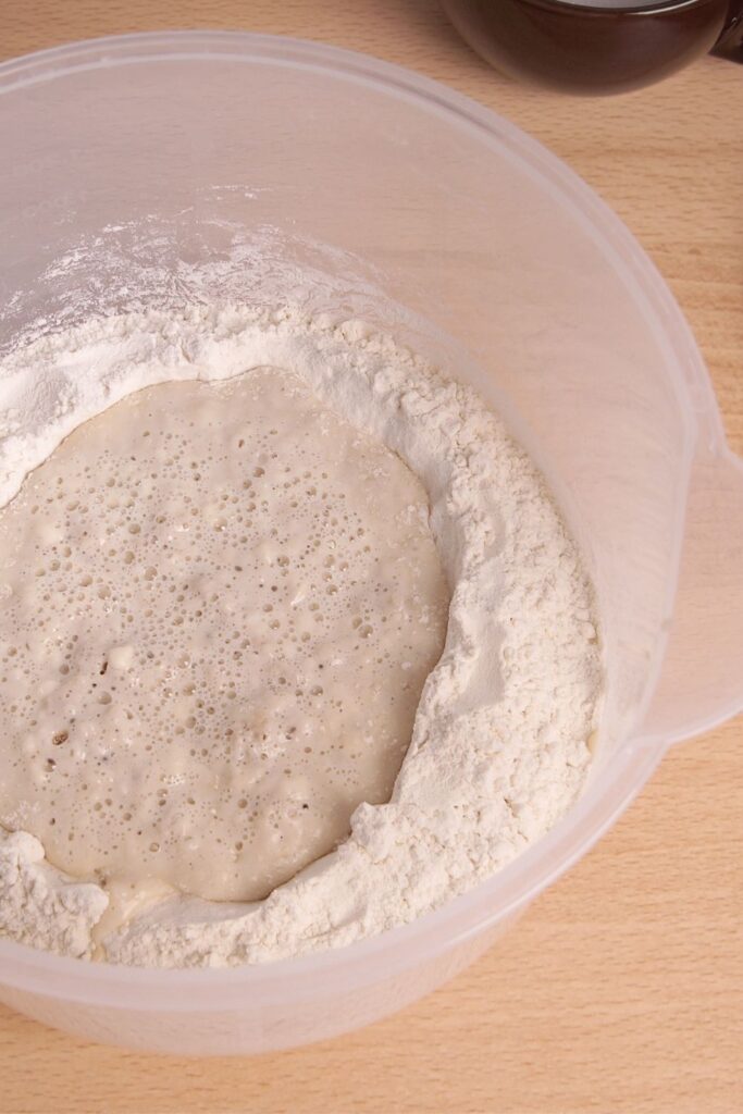 Poolish in a plastic measuring jug.