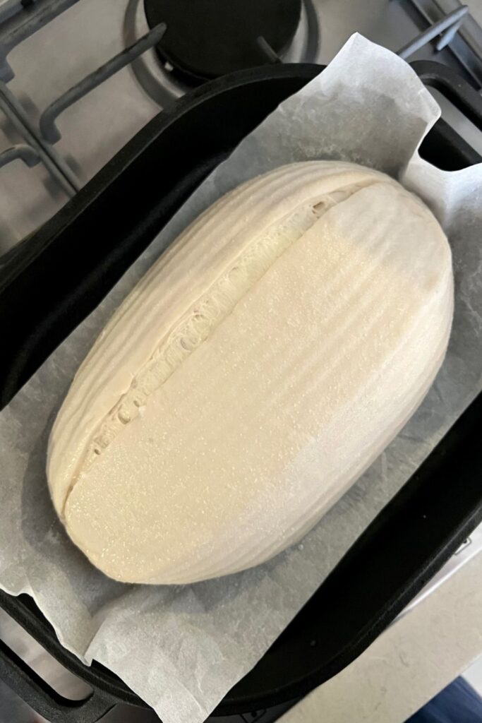 Will baking with ice give you better sourdough bread? This photo shows a sourdough loaf just before it's placed into the oven.