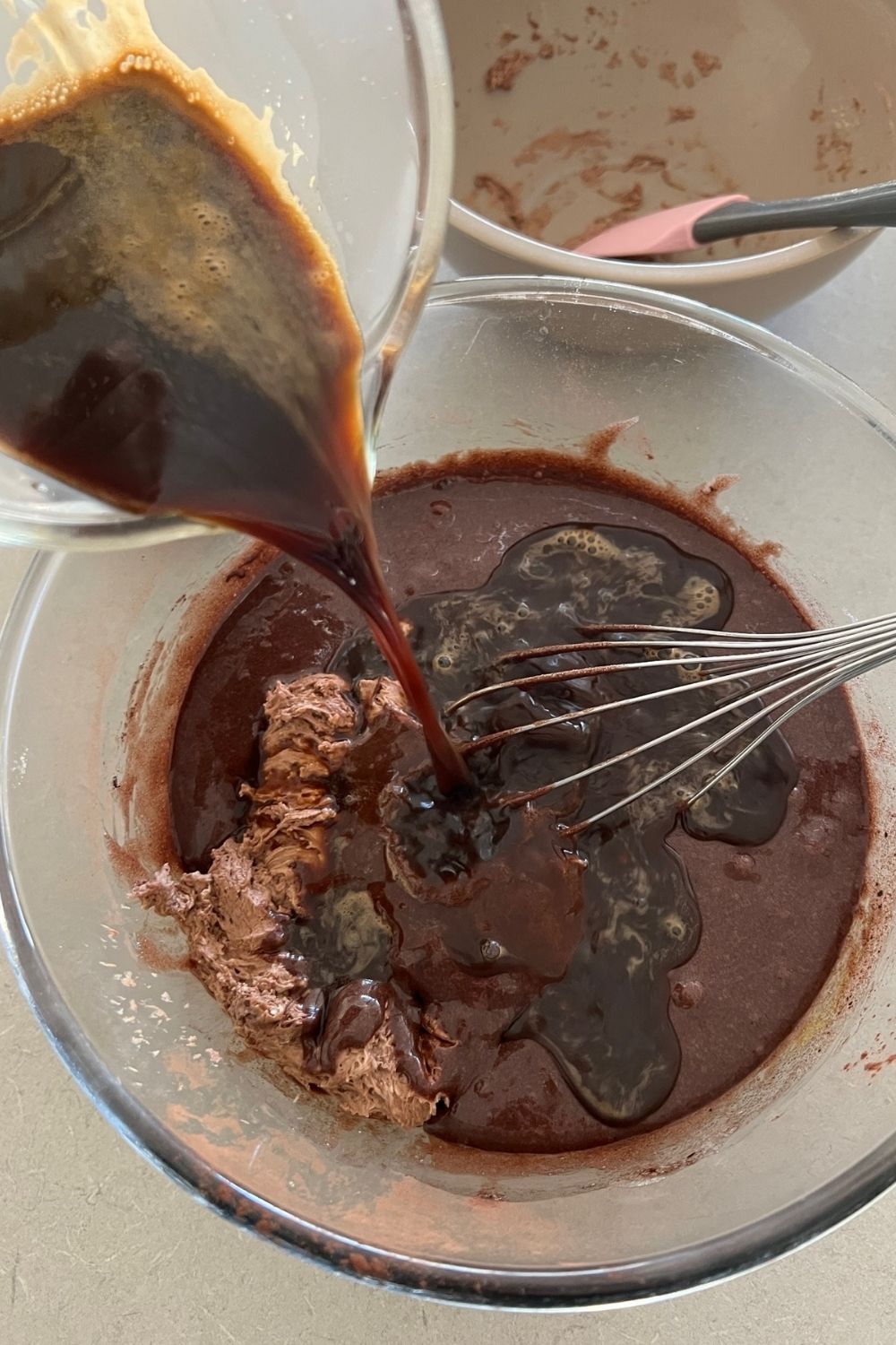 Adding hot coffee and preferment to sourdough chocolate cake batter