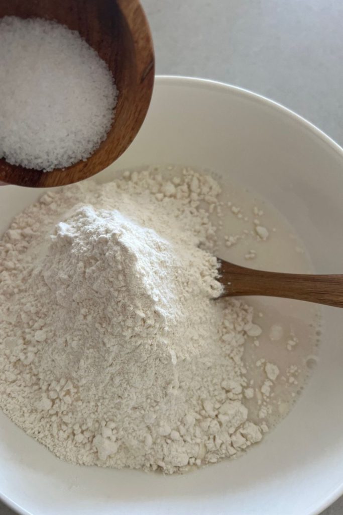 Adding flour and salt to same day sourdough bread.