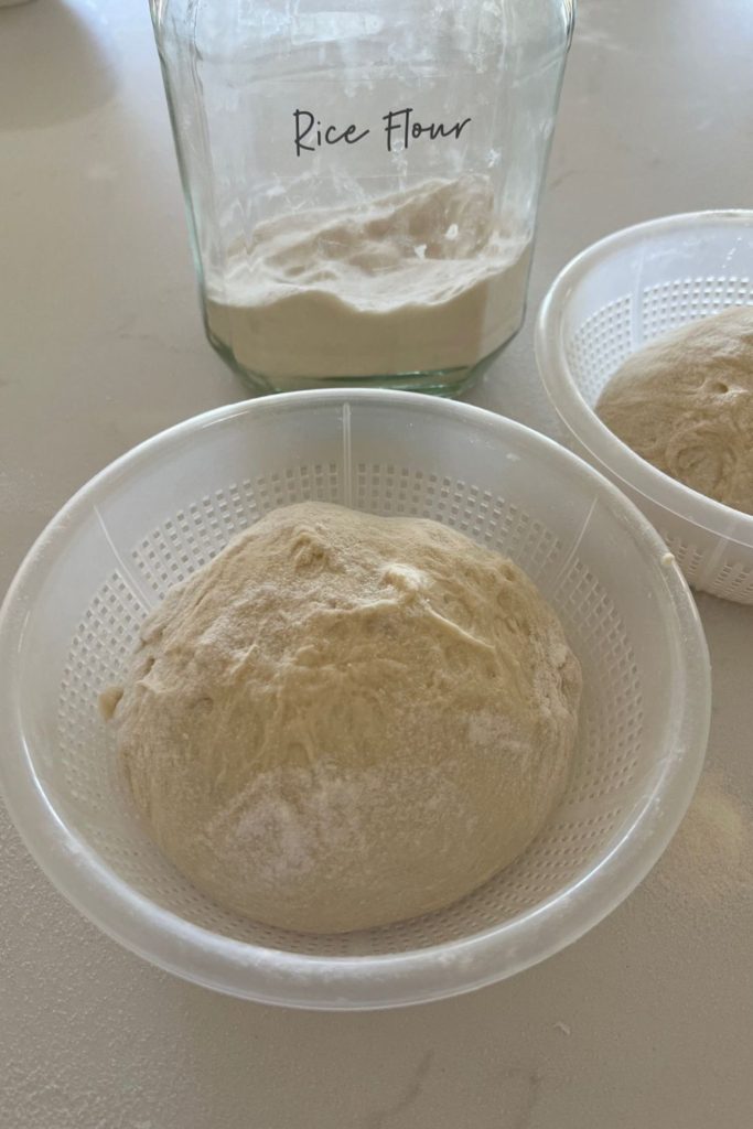 Small batch sourdough that has been coated in rice flour and lifted into banneton (which is a ricotta basket).