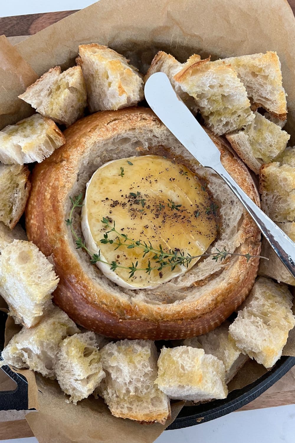 Baked Brie in a Sourdough Bread Bowl [with honey & thyme] - The