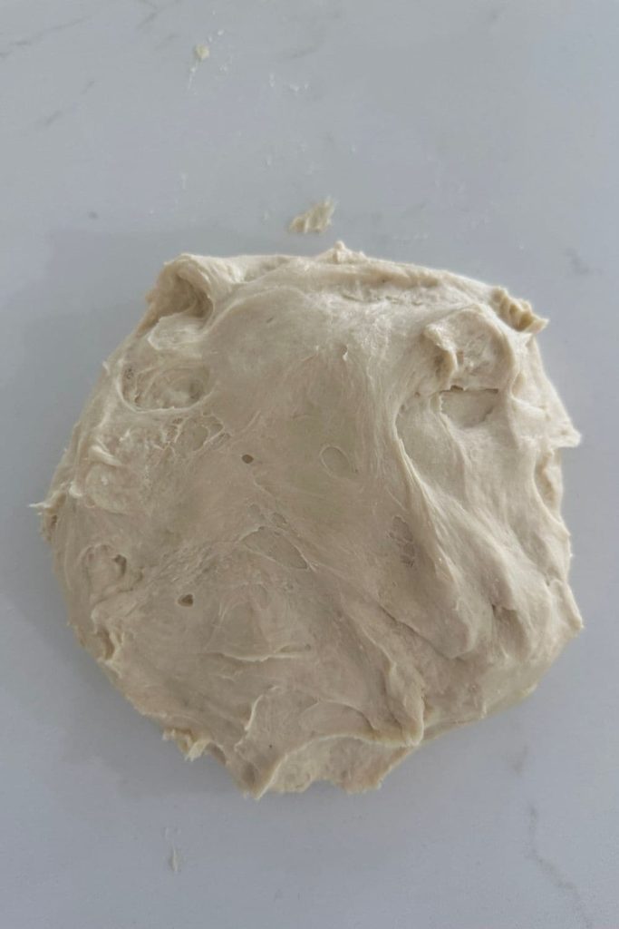 Sourdough pampushky dough that has been kneaded until stretchy and elastic.