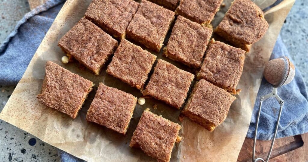 Sourdough discard blondies cut into 12 equal squares.