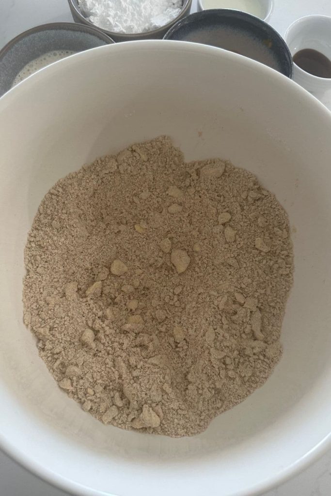 A mixing bowl showing that the butter has been rubbed into the dry ingredients to form coarse crumbs.