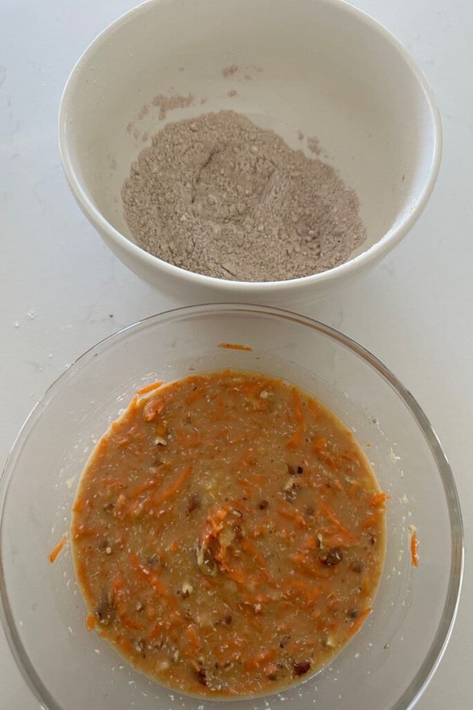 Bowl of wet ingredients and bowl of dry ingredients sitting side by side.