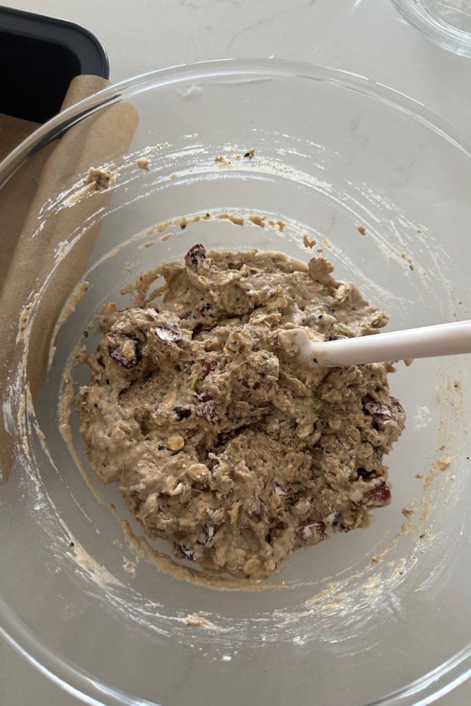 Wet and dry ingredients mixed together to create the batter for the sourdough fruit and seed crackers.