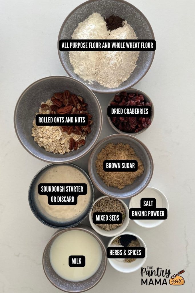 Flat lay of ingredients necessary to make sourdough fruit and seed crackers.