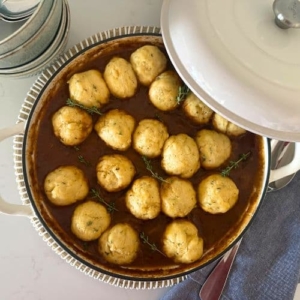 BEEF AND GUINNESS IRISH STEW TOPPED WITH SOURDOUGH HERB DUMPLINGS - RECIPE FEATURE IMAGE
