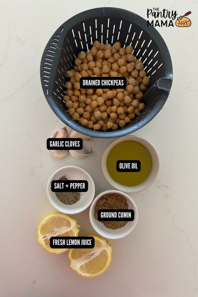 flat lay of ingredients necessary to make a hummus without tahini recipe.