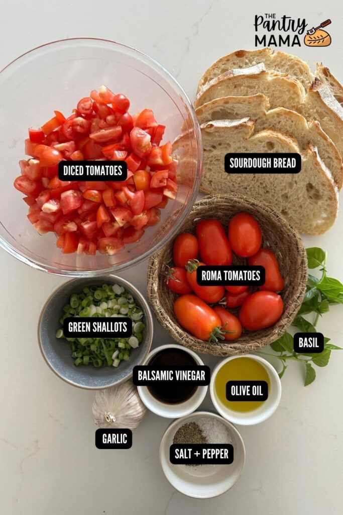 A flat lay of ingredients necessary to make sourdough bruschetta.