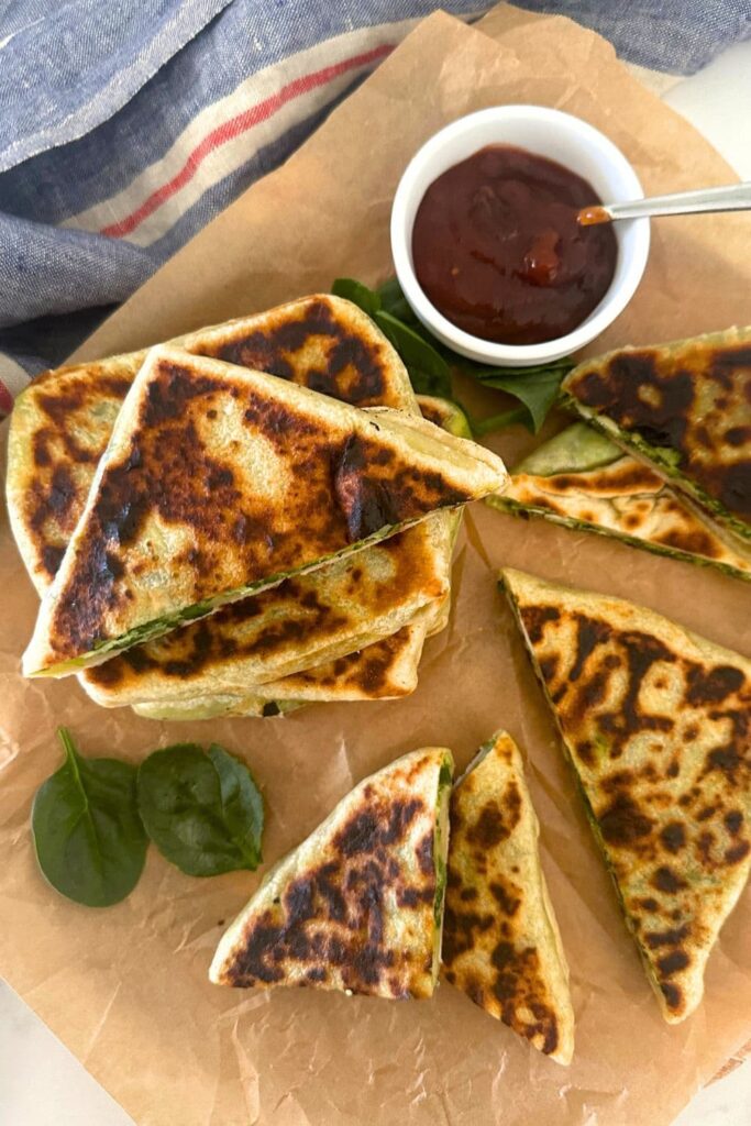 Sourdough gozleme filled with spinach and feta and served with a fruit chutney. 