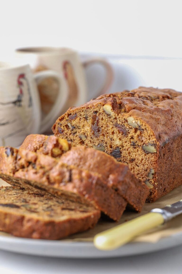 Sourdough date and walnut loaf cake sliced and ready to add butter.