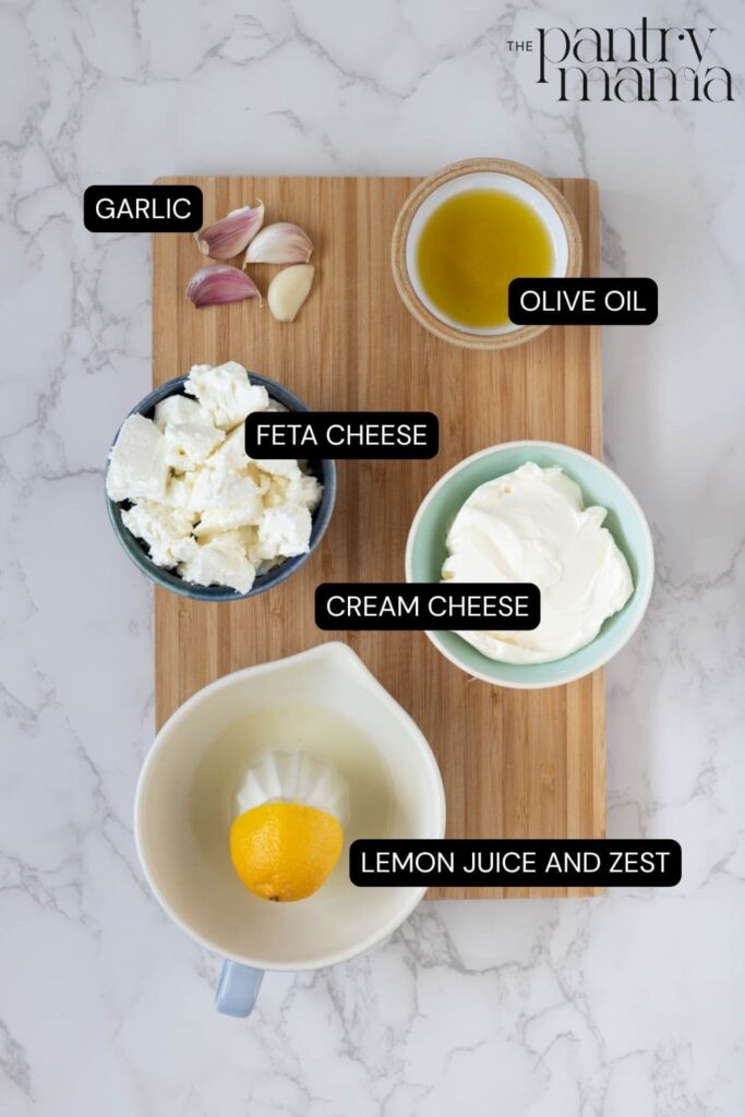 Flat lay of ingredients necessary to make whipped feta dip.
